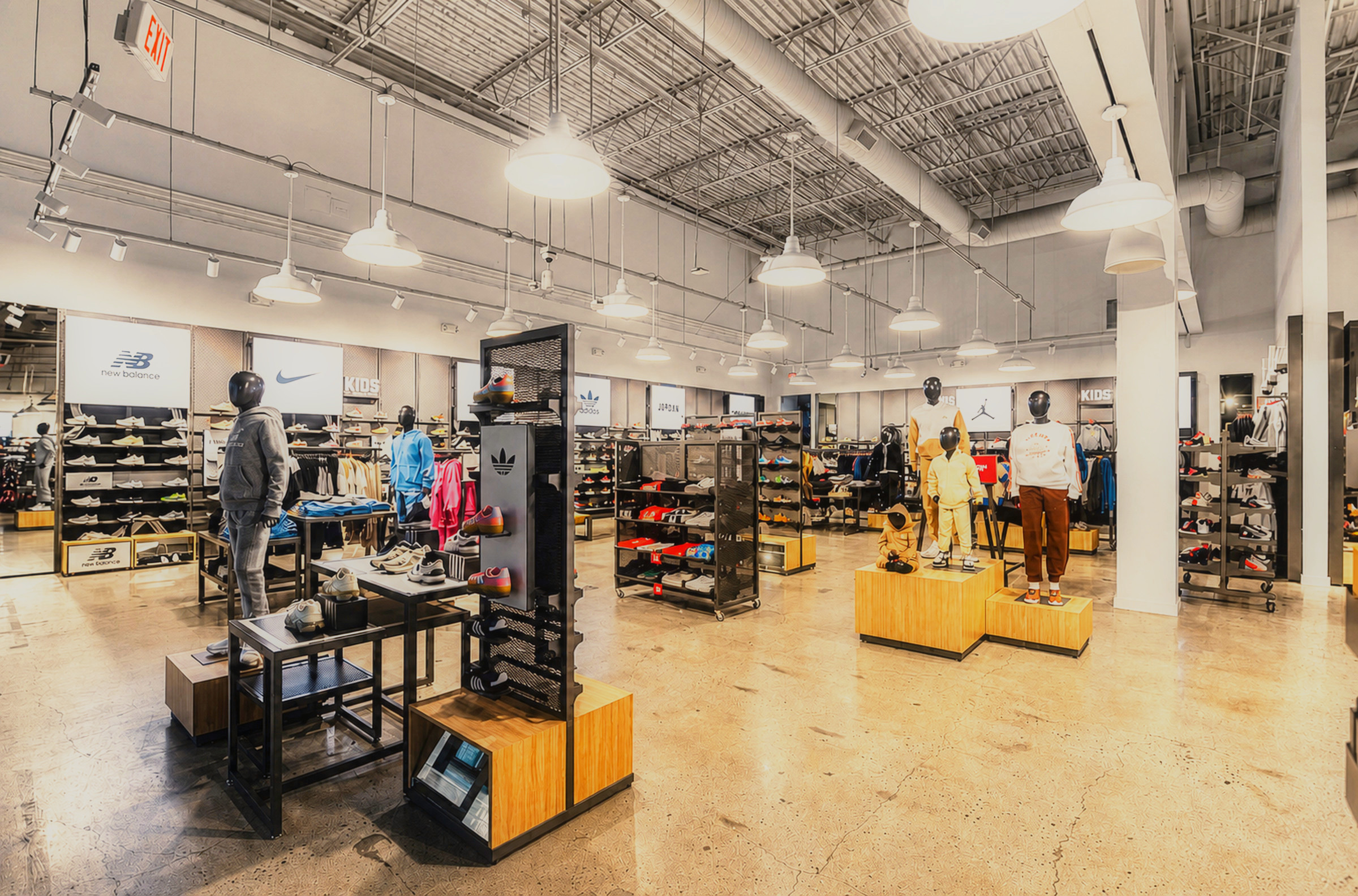Completed athletic footwear store with brand shop-in-shops